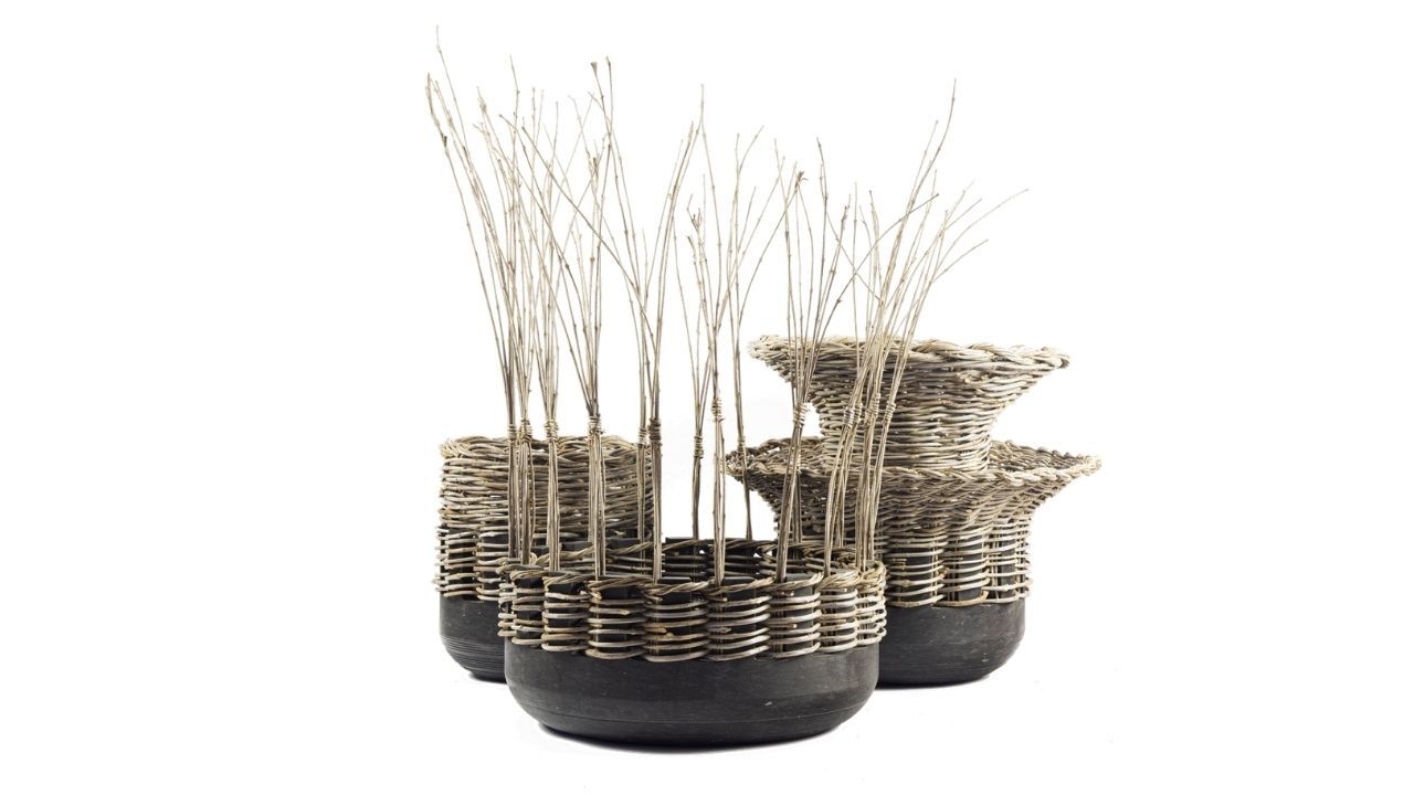 CORBELLO — LA CASA DI PIETRA. MATERIAL EXPLORATION  —  COLLABORATION. A collection of vessels in Jerissa stone and woven olive strands inspired by the idea of rediscovery.