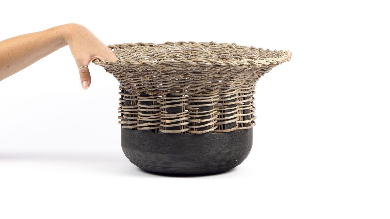 CORBELLO — LA CASA DI PIETRA. MATERIAL EXPLORATION  —  COLLABORATION. A collection of vessels in Jerissa stone and woven olive strands inspired by the idea of rediscovery.